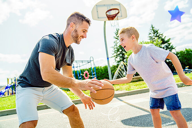 Father-son basketball time: Sharing laughs and skills.