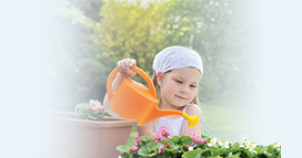 Girl watering flowers