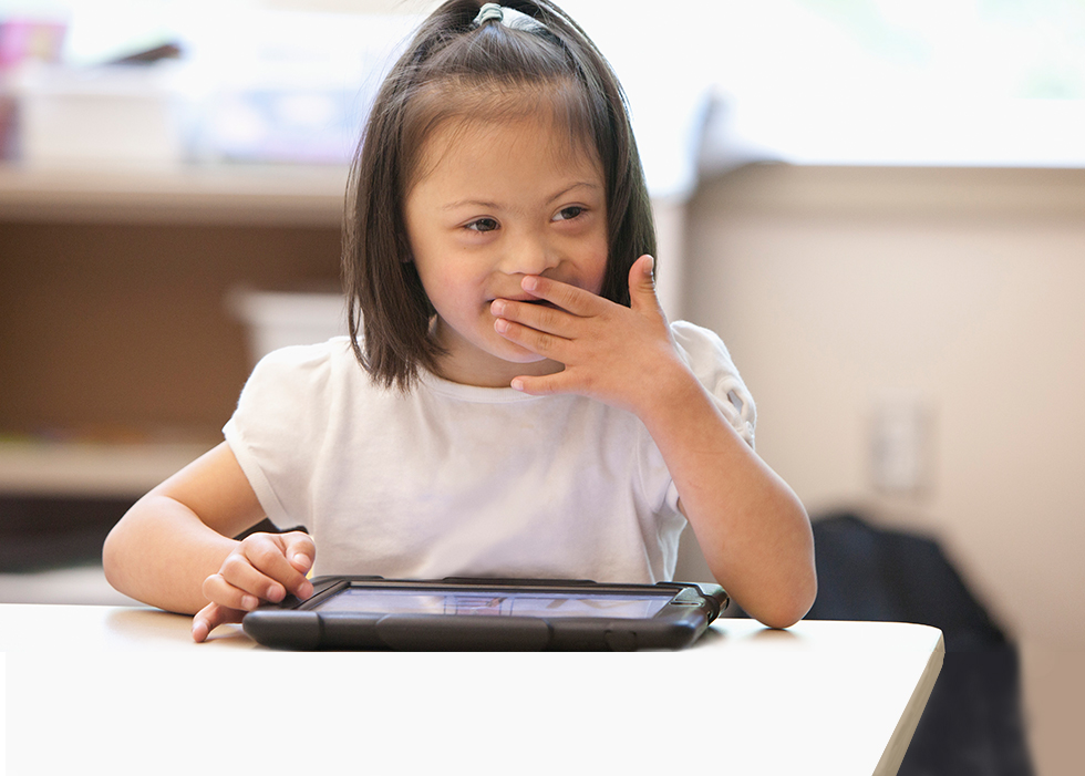 Man sitting down using a laptop